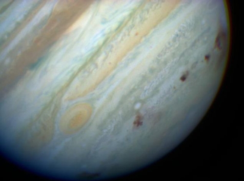 Spots indicating comet collsion with planet Jupiter