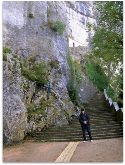 John about to climb the steps on the pathway through the forest to the Grotto la Sainte-Baume