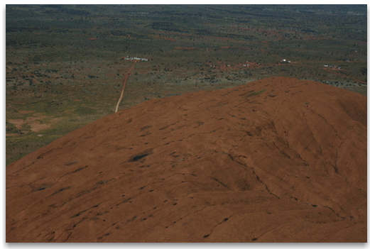 view of Ayers Rock Ansett Resort from the air