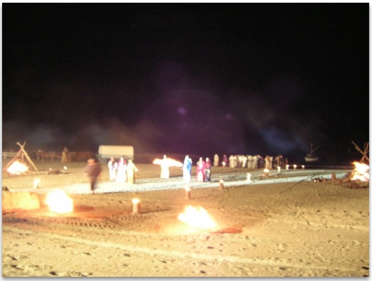 Orbs visible behind bonfires and smoke at the evocation of Les Saintes Maries de la Mer - large purple orb in the foreground