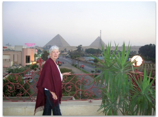 Photo of from the Hotel with Pyramids behind Valerie Barrow