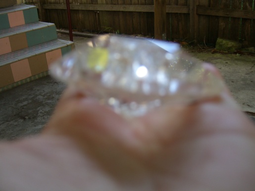 crystal overlighted by spirit hand