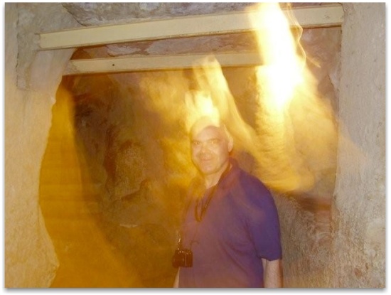 Photo of light around a man inside the Great Pyramid