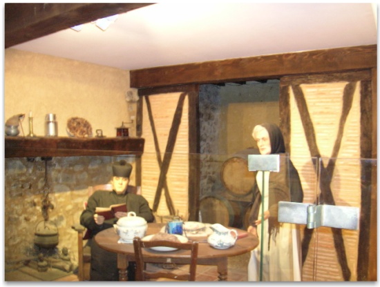 Museum image of Fr Sauniere with his houskeeper