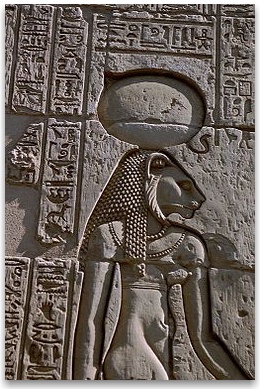 The warrior goddess  Sekhmet, shown with her sun disk and cobra crown
