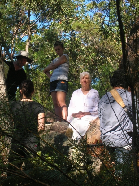 Valerie Barrow with film crew, under the grandmother tree at Kariong