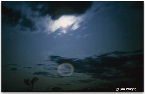 Photo of the sky at night taken near Uluru showing orb of light