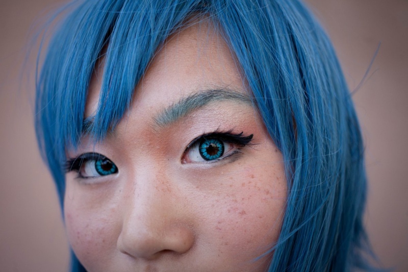 woman with blue hair, blue irises